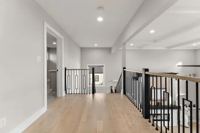 a view of a hallway with a livingroom