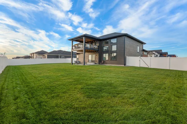 a view of a house with a big yard