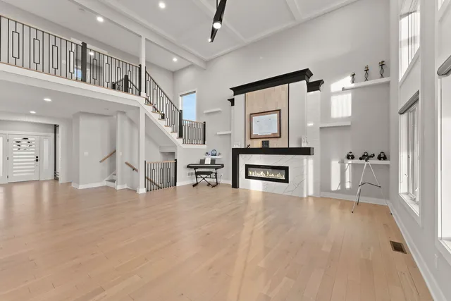 a view of a livingroom with wooden floor