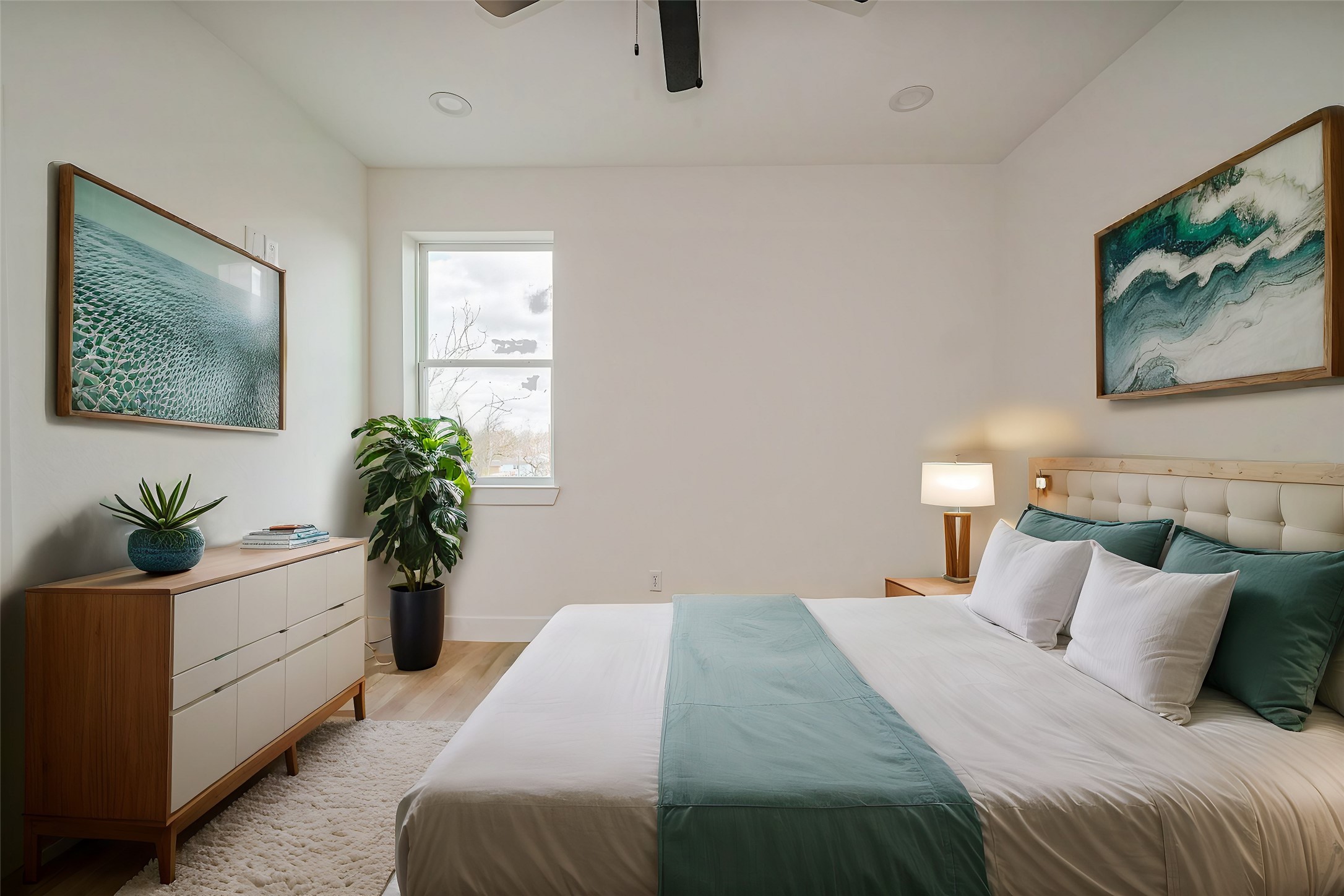 4207 Ward Street Houston, TX 77021 - Photo 36 of 43 a bedroom with a bed and a potted plant