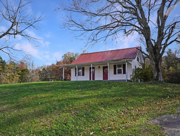 a view of a house with a big yard