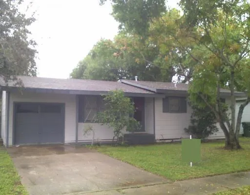front view of house with a yard