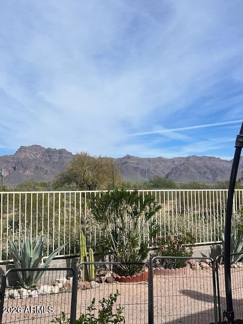 3301 South Goldfield Road, Unit 4028 Apache Junction, AZ 85119 - Photo 42 of 43 a view of a balcony with an outdoor space