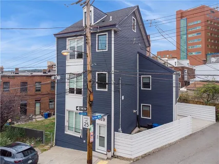 a brick building with a large windows