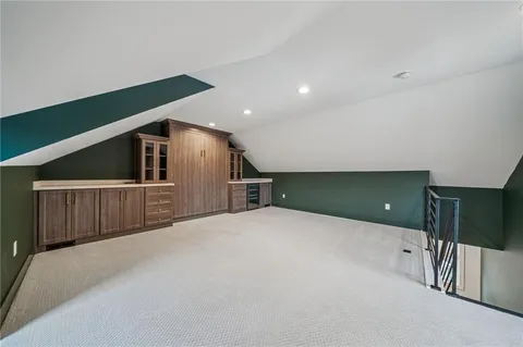 a bedroom with furniture and window