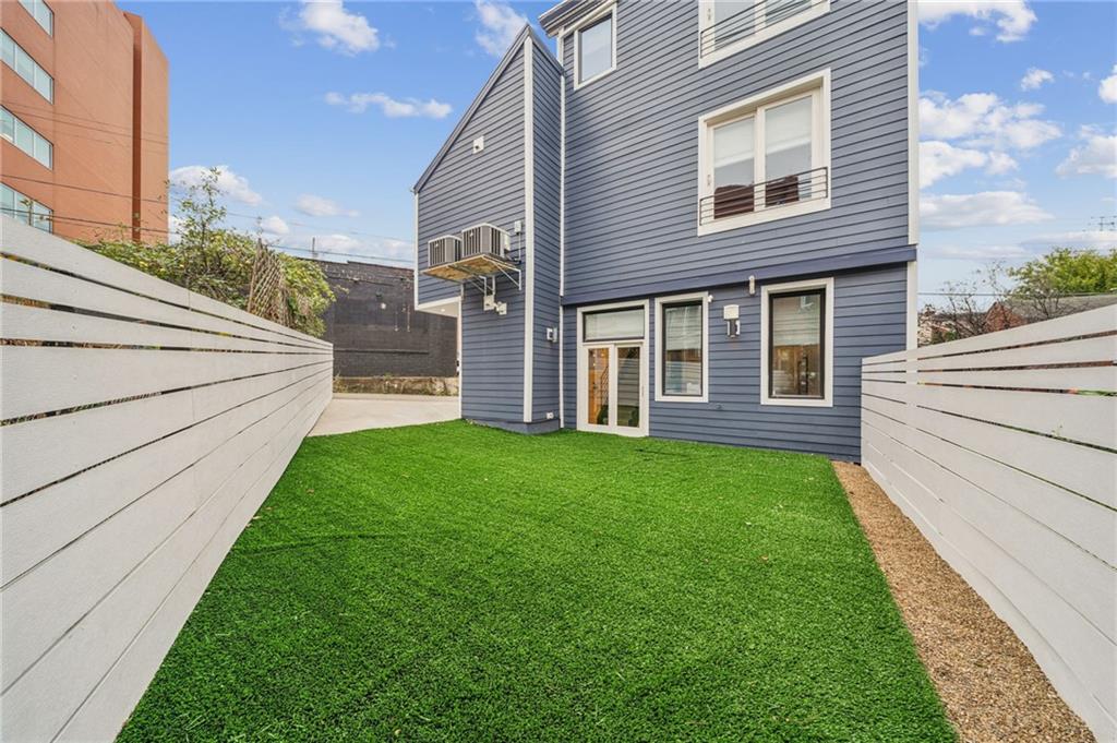 469 42nd Street Pittsburgh, PA 15201 - Photo 30 of 34 a view of a house with a backyard
