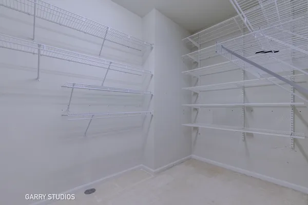 a view of a room with racks on the wall