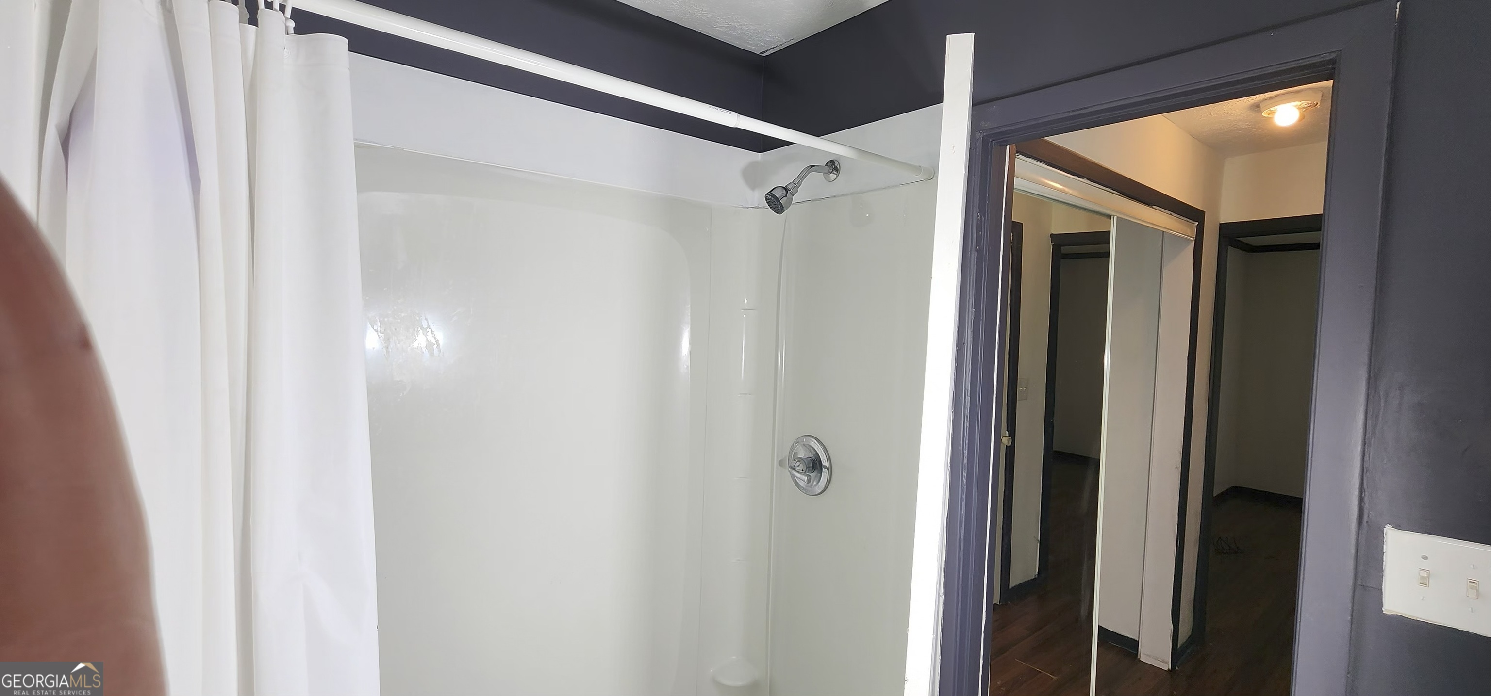 2805 Northeast Expressway Northeast, Unit B36 Atlanta, GA 30345 - Photo 20 of 30 a view of a bathroom from a hallway