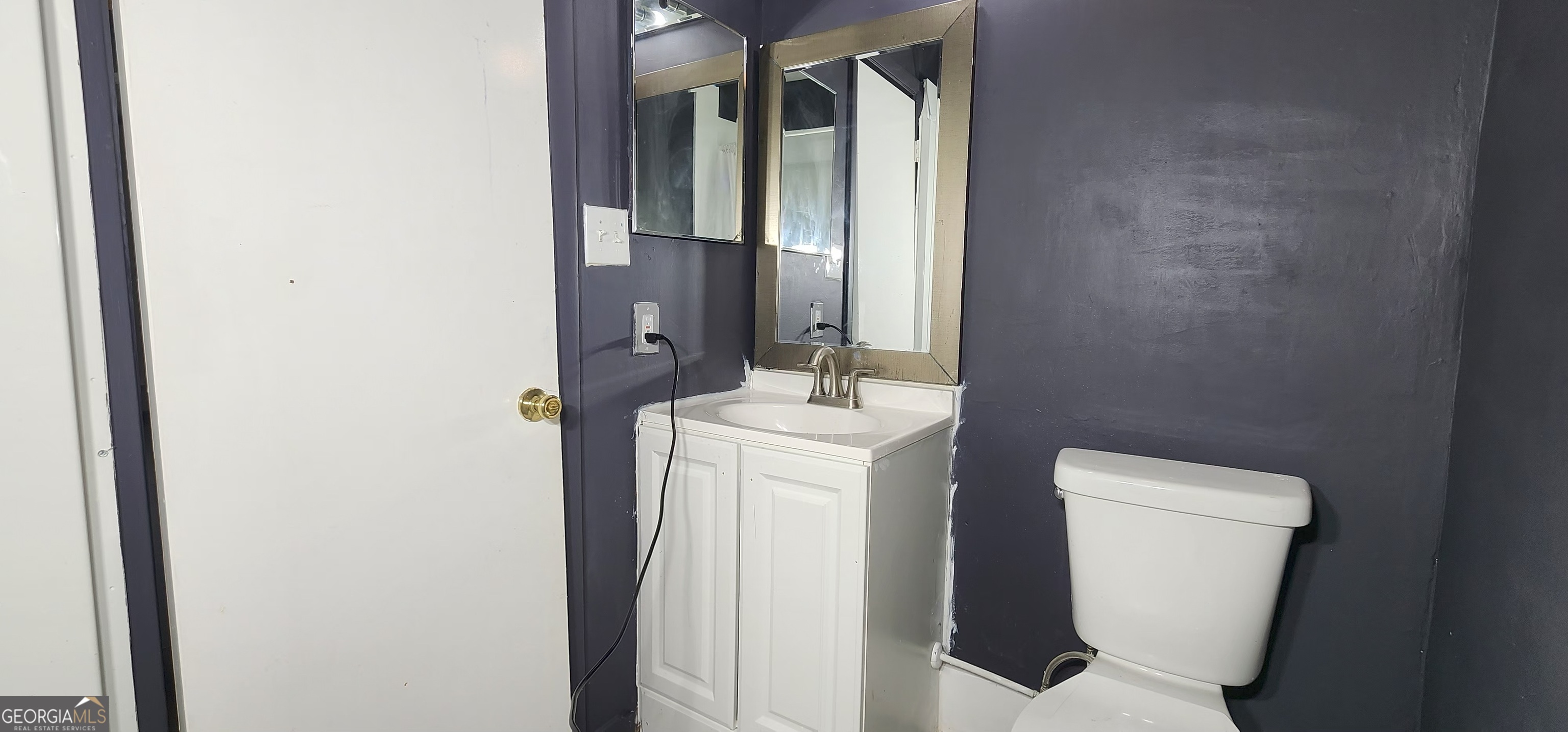 2805 Northeast Expressway Northeast, Unit B36 Atlanta, GA 30345 - Photo 23 of 30 a bathroom with a toilet and a sink
