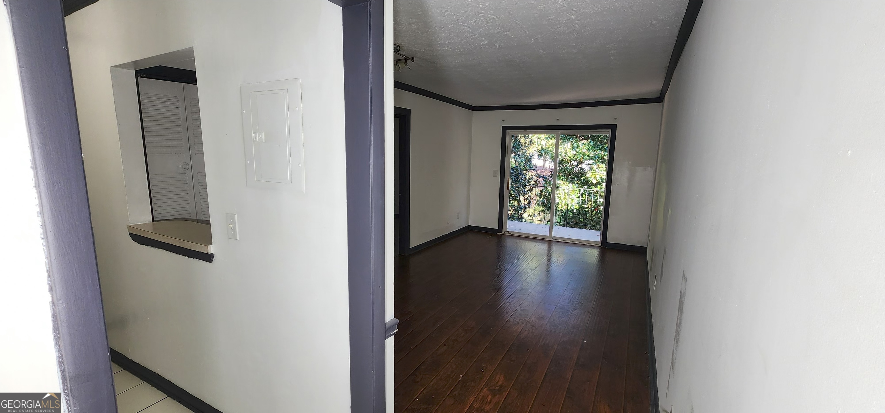 2805 Northeast Expressway Northeast, Unit B36 Atlanta, GA 30345 - Photo 6 of 30 a view of a hallway with wooden floor