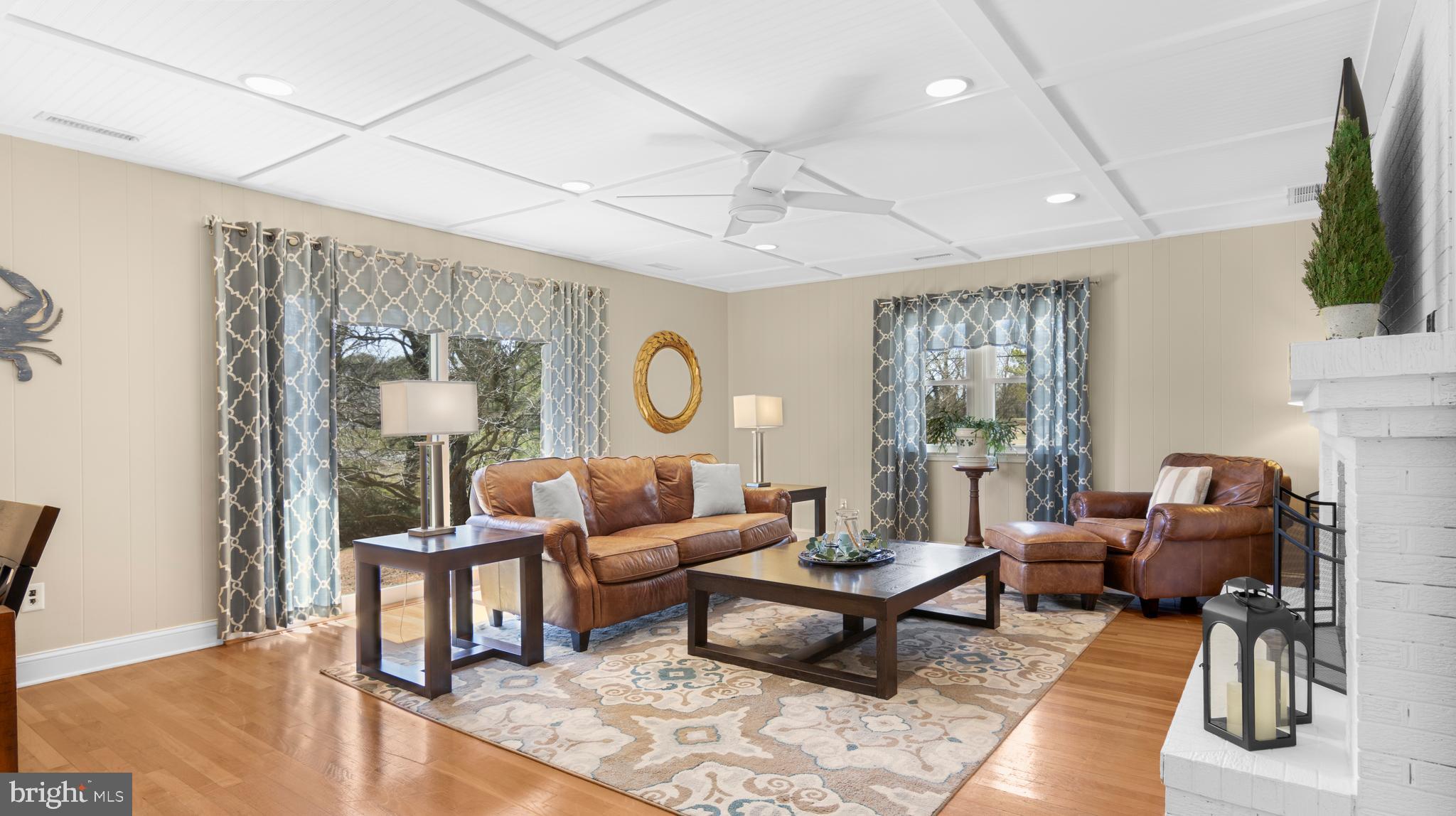 5505 Whitehall Road Cambridge, MD 21613 - Photo 11 of 44 a living room with furniture and a large window