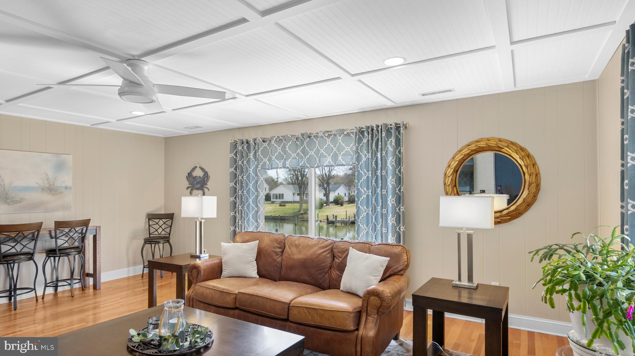5505 Whitehall Road Cambridge, MD 21613 - Photo 14 of 44 a living room with furniture and a large window