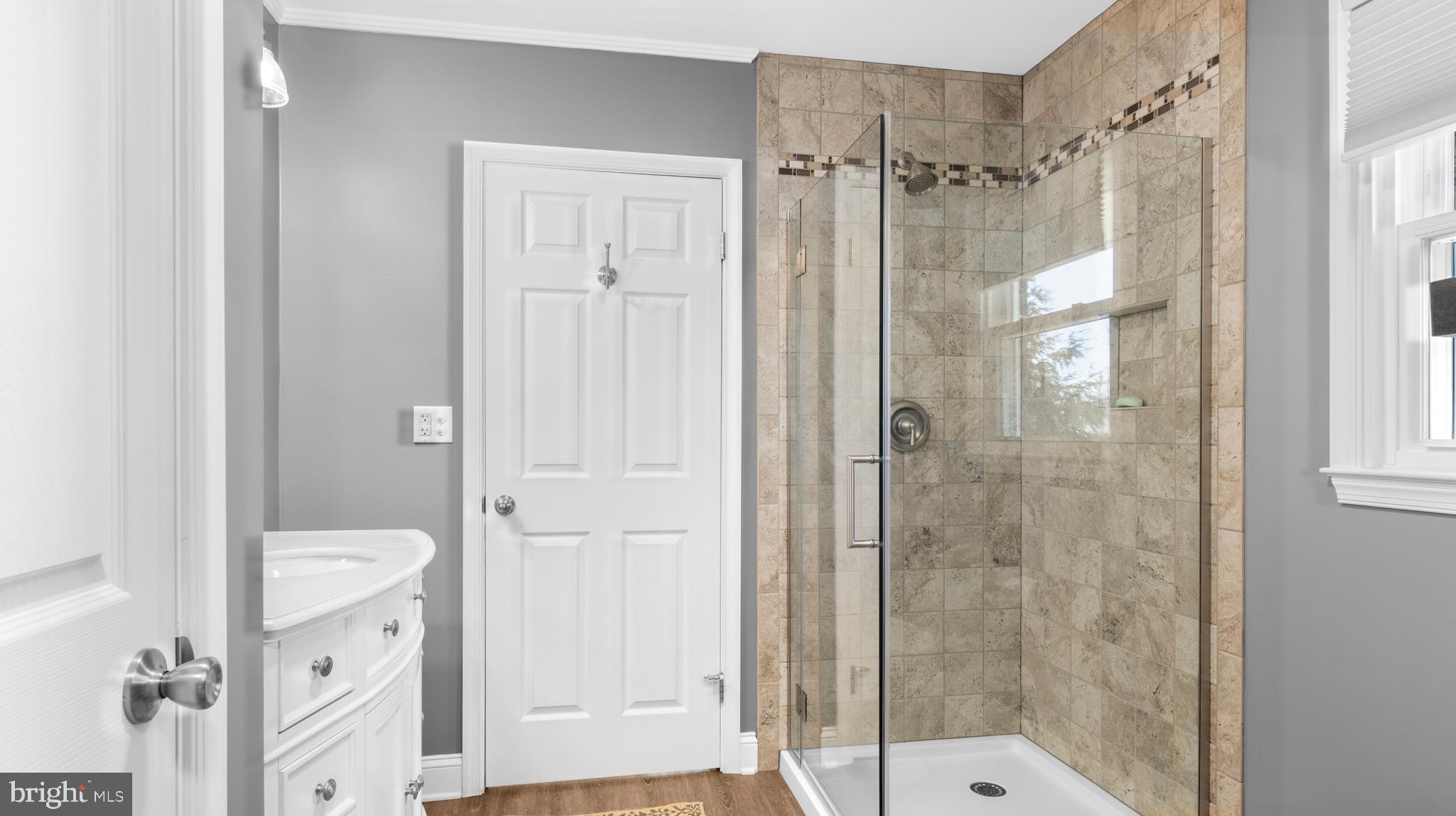 5505 Whitehall Road Cambridge, MD 21613 - Photo 16 of 44 a bathroom with a shower and a sink