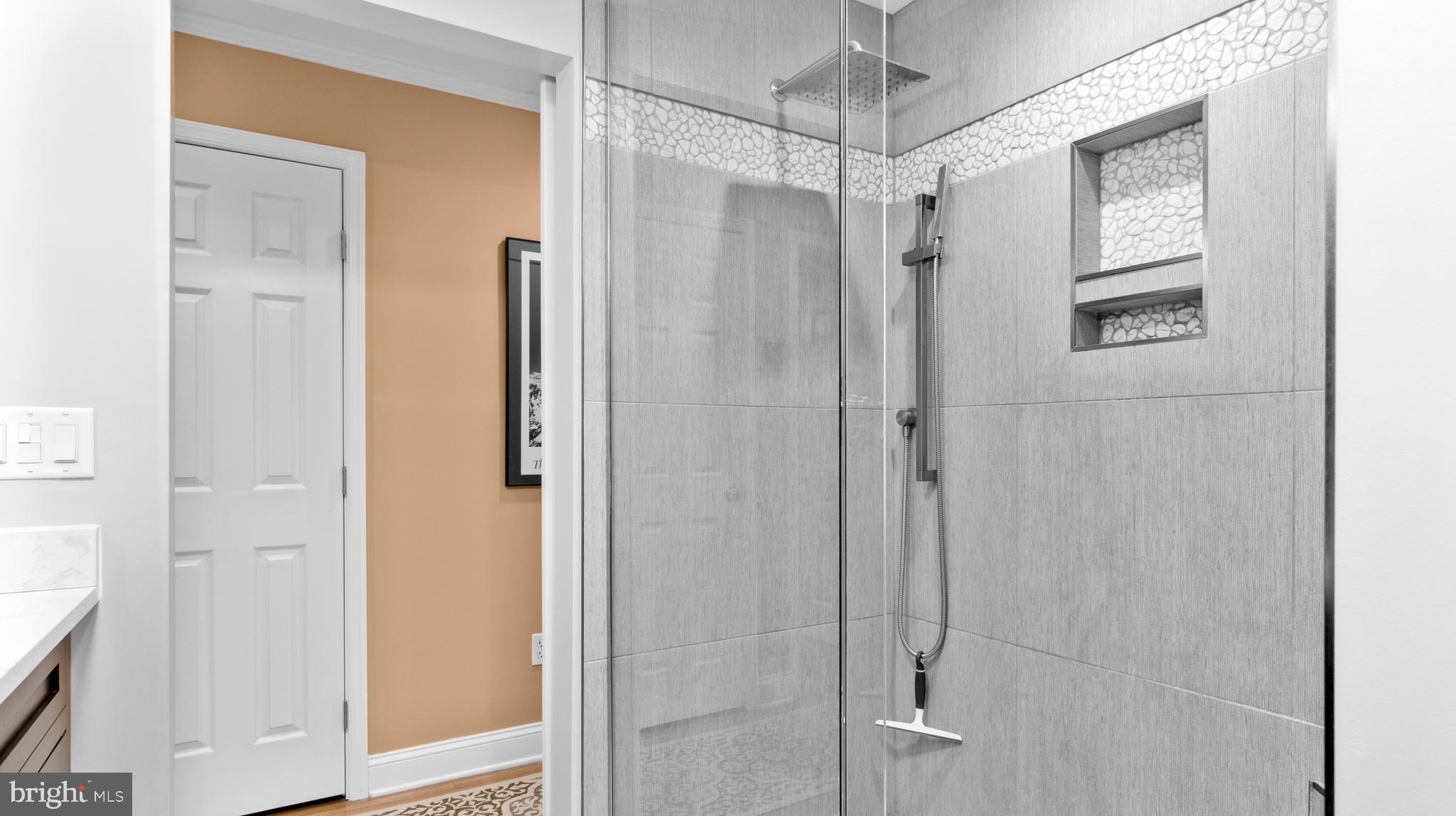 5505 Whitehall Road Cambridge, MD 21613 - Photo 24 of 44 a bathroom with a shower and a glass door