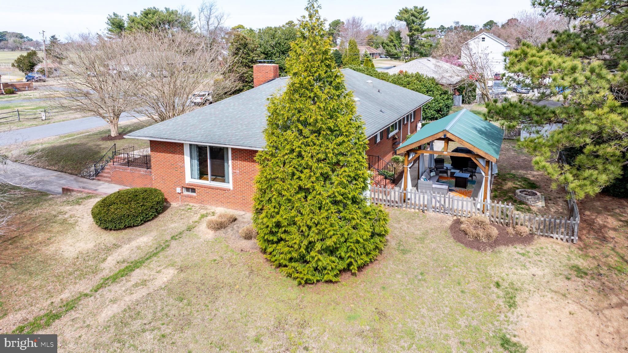 5505 Whitehall Road Cambridge, MD 21613 - Photo 38 of 44 front view of a house with a yard
