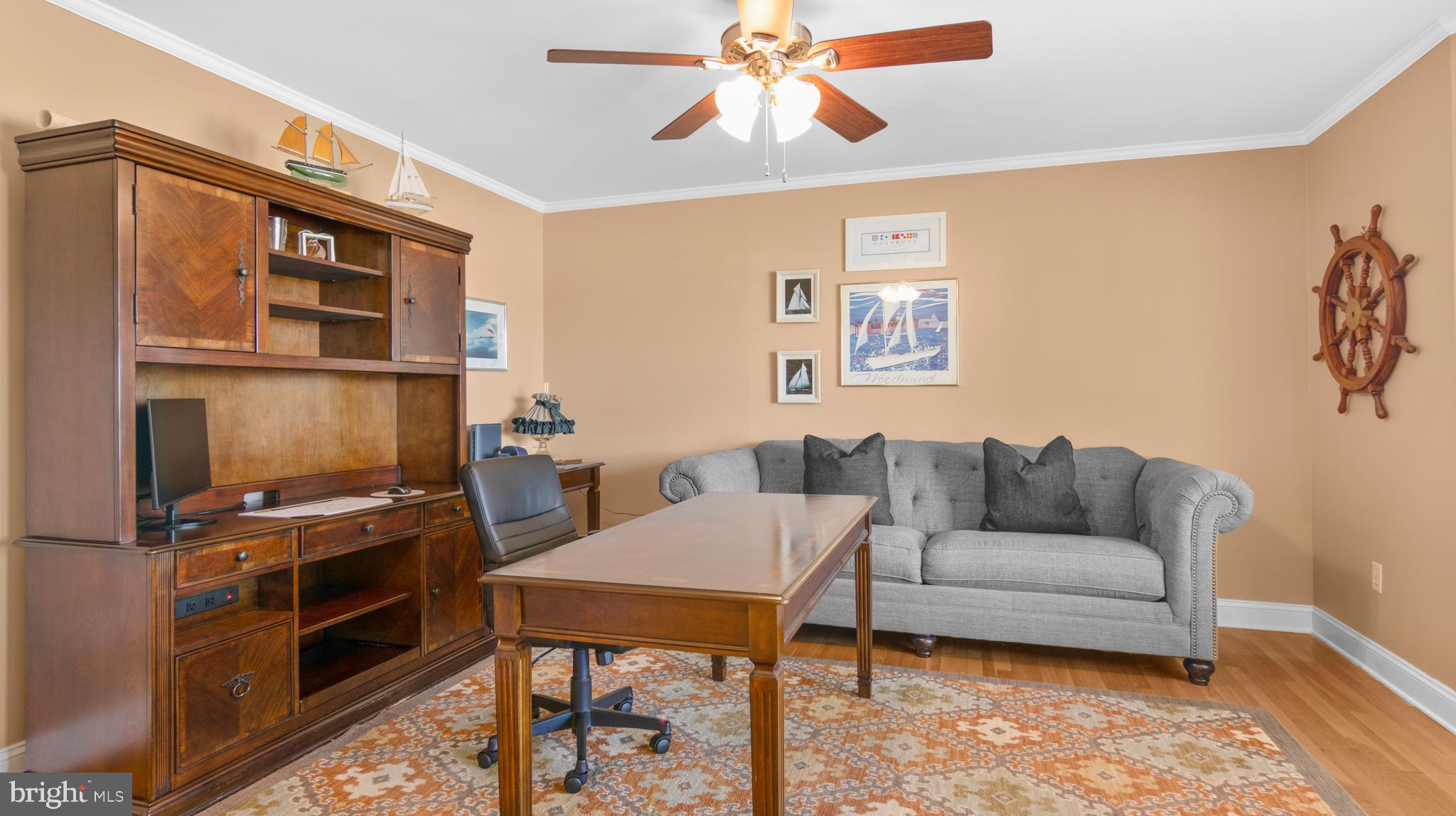 5505 Whitehall Road Cambridge, MD 21613 - Photo 5 of 44 a living room with furniture a rug and a window