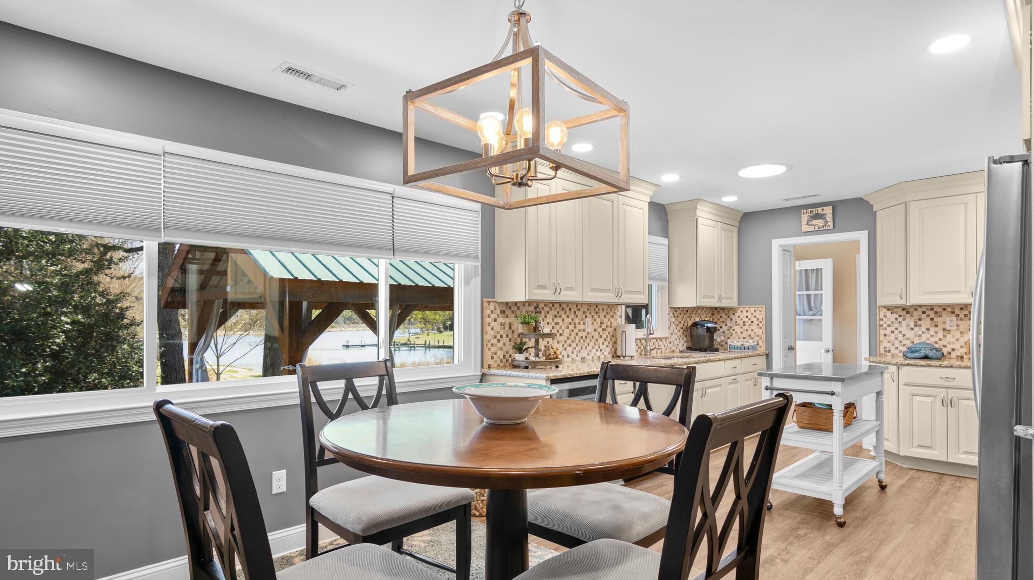 5505 Whitehall Road Cambridge, MD 21613 - Photo 6 of 44 a view of a dining room with furniture window and outside view