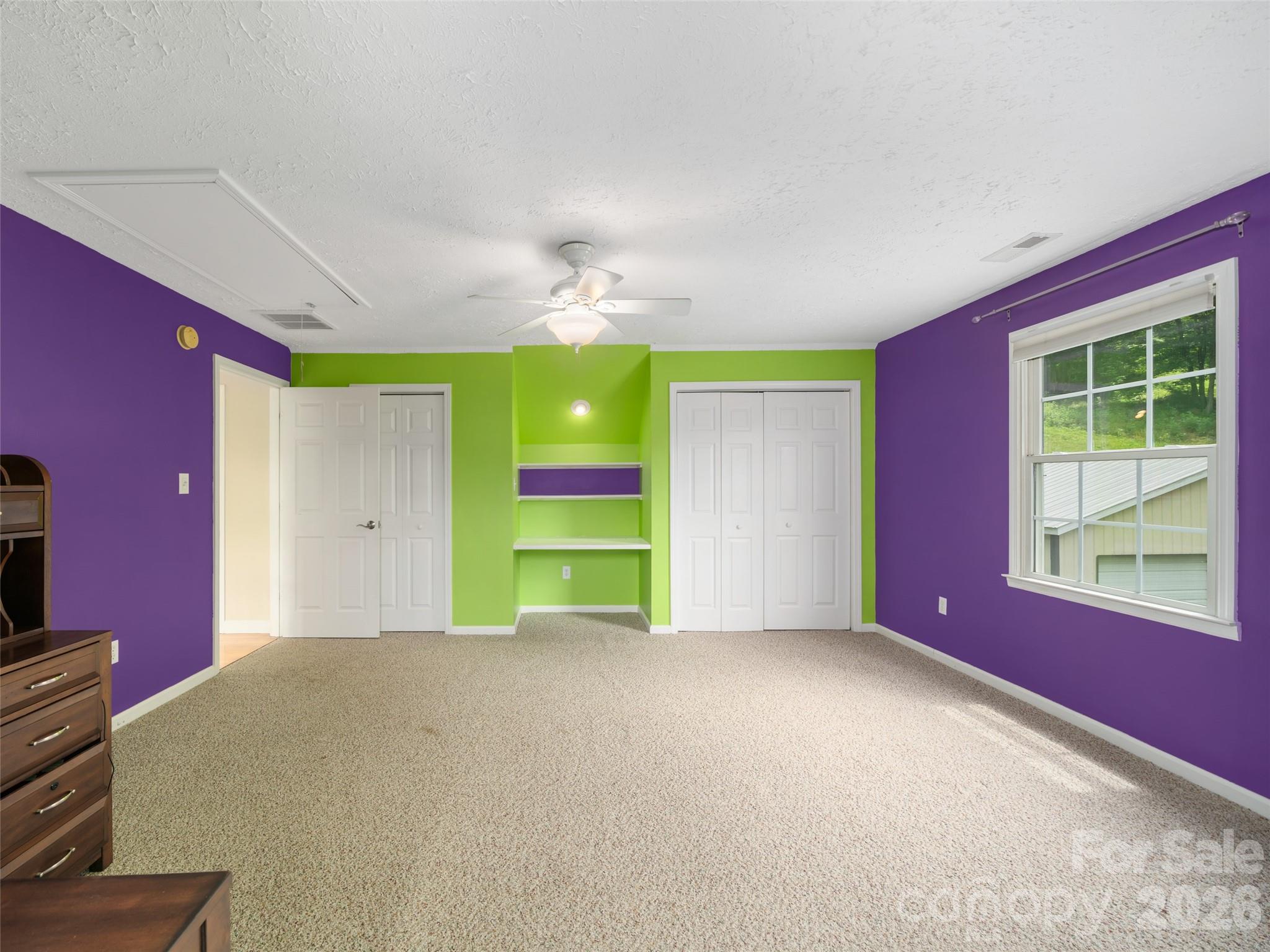 2216 Beans Creek Road Bakersville, NC 28705 - Photo 25 of 39 a view of a livingroom with furniture and window