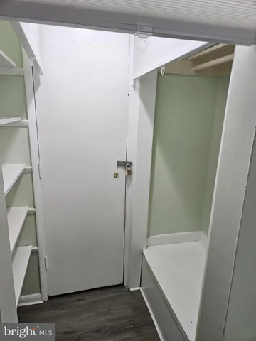 a bathroom with a shower and a bath tub