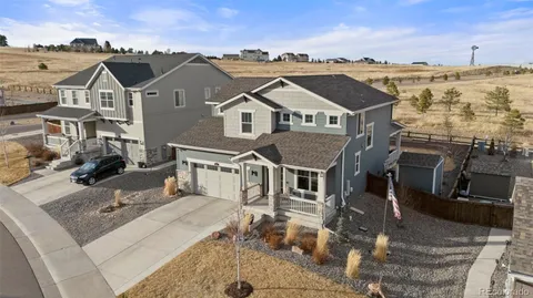 an aerial view of a house with a terrace