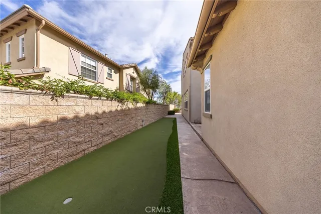 a view of a street with a building in the background