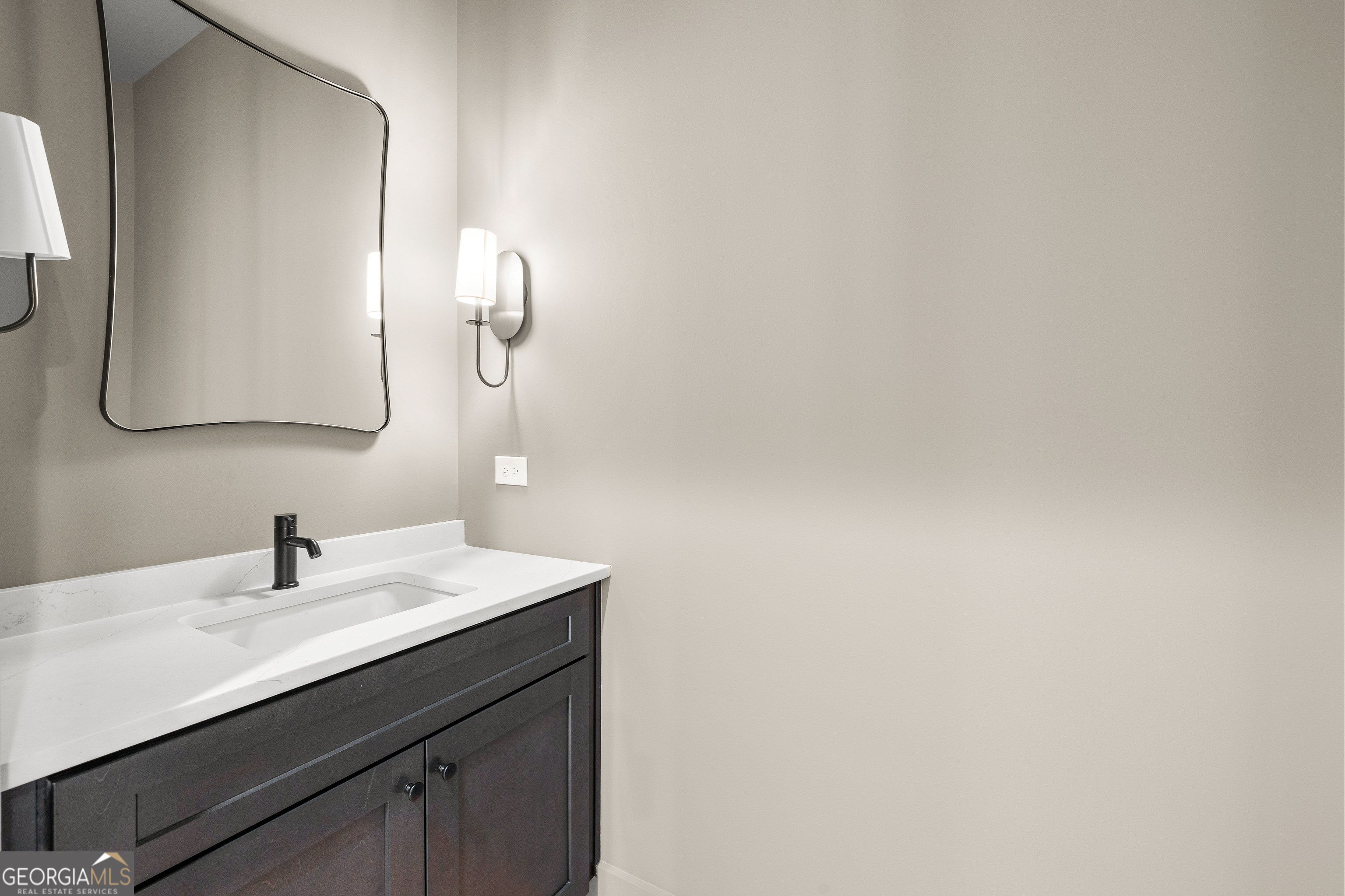 225 Rolison Way Fayetteville, GA 30214 - Photo 17 of 46 a bathroom with a sink and a mirror