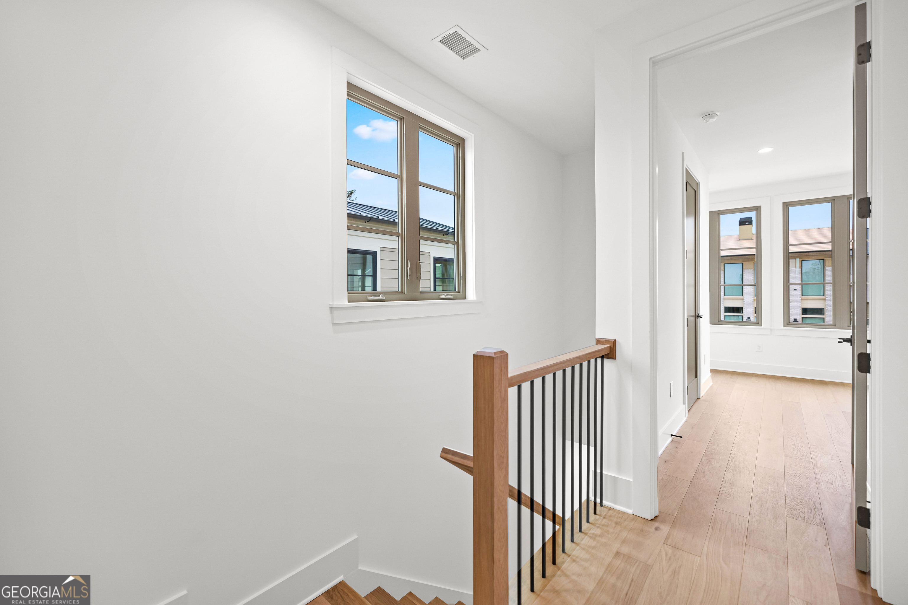 225 Rolison Way Fayetteville, GA 30214 - Photo 21 of 46 an entryway with wooden floor and windows