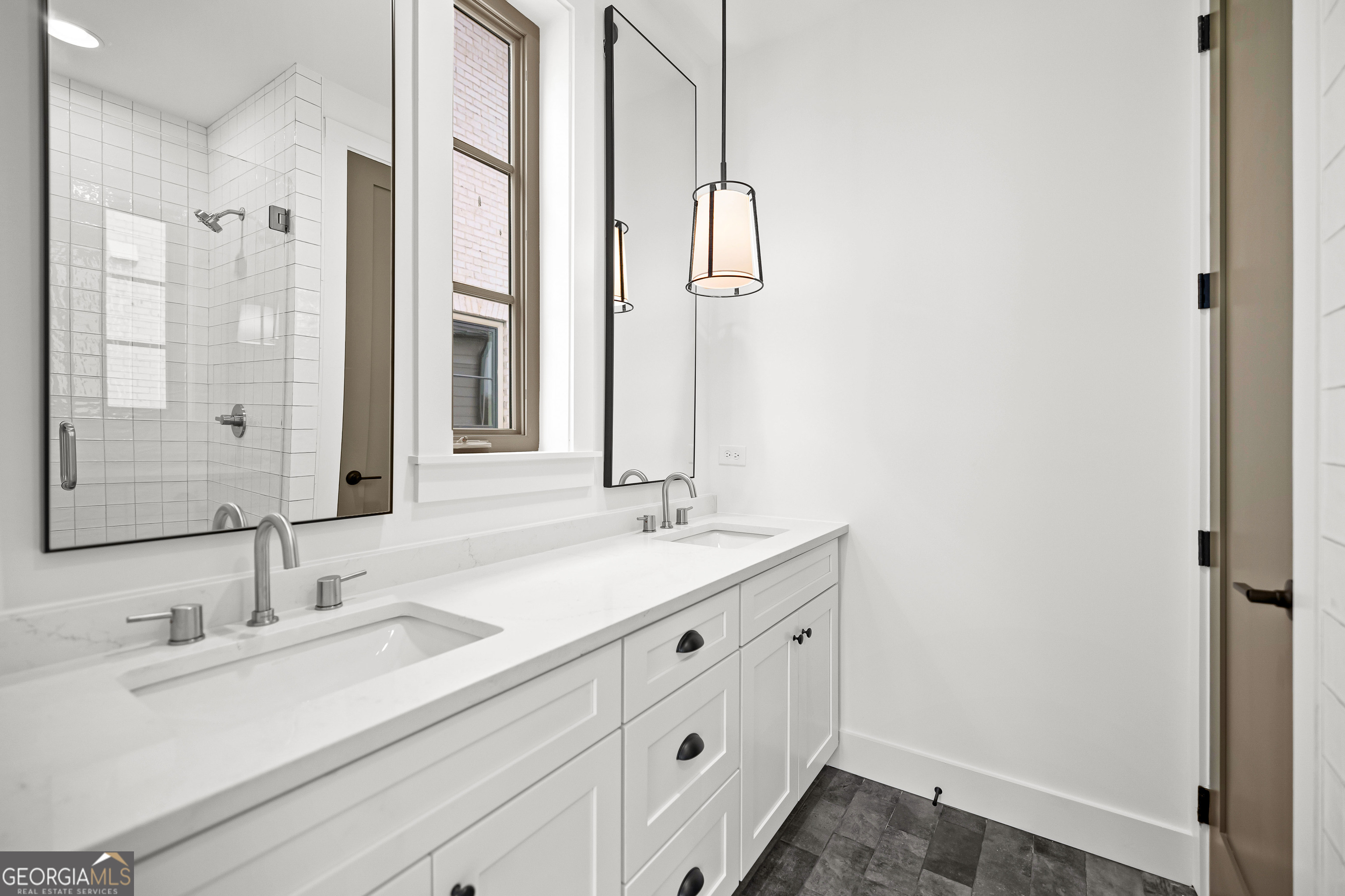 225 Rolison Way Fayetteville, GA 30214 - Photo 32 of 46 a bathroom with a double vanity sink and mirror