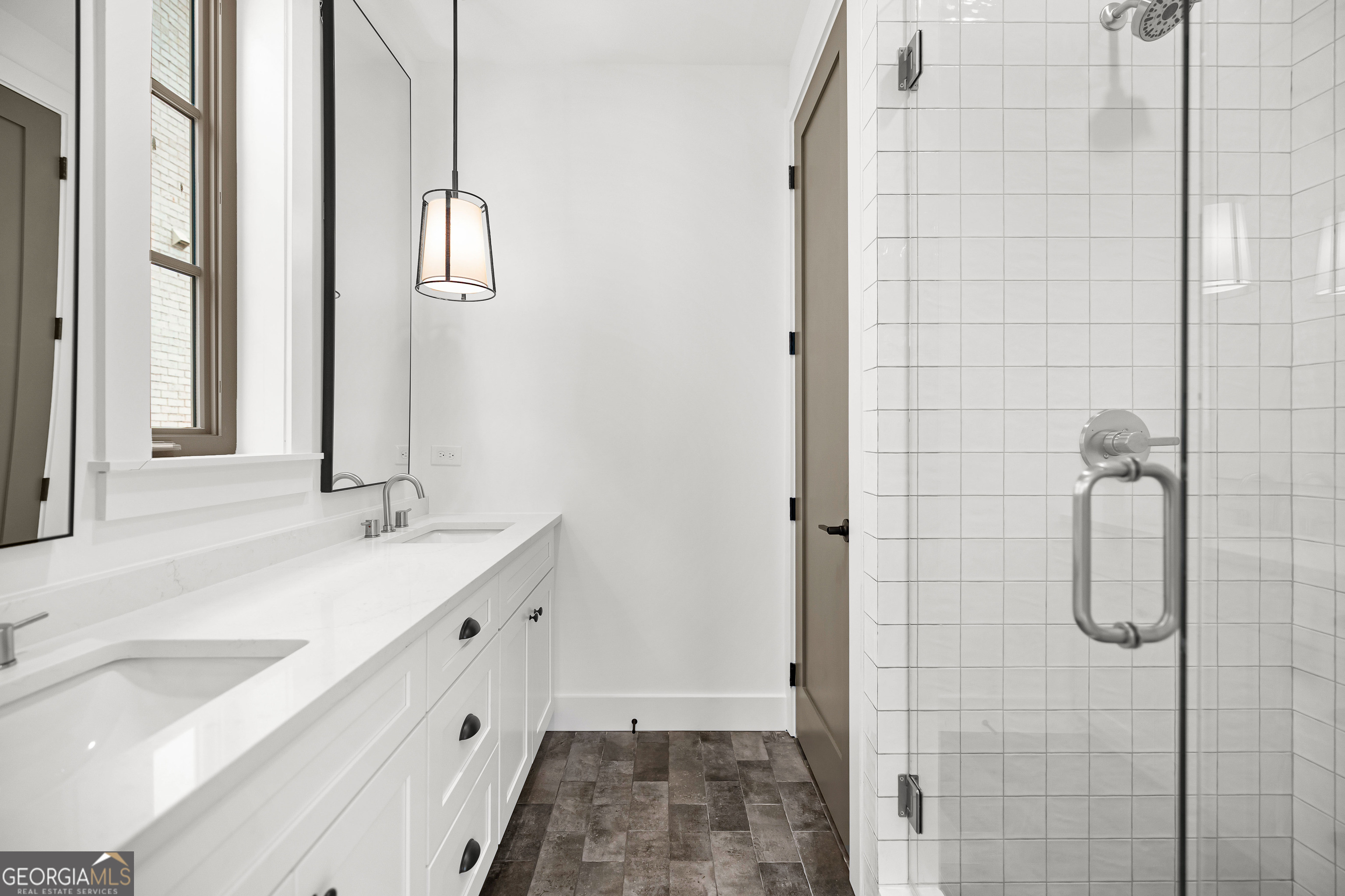 225 Rolison Way Fayetteville, GA 30214 - Photo 34 of 46 a bathroom with a double vanity sink and mirror
