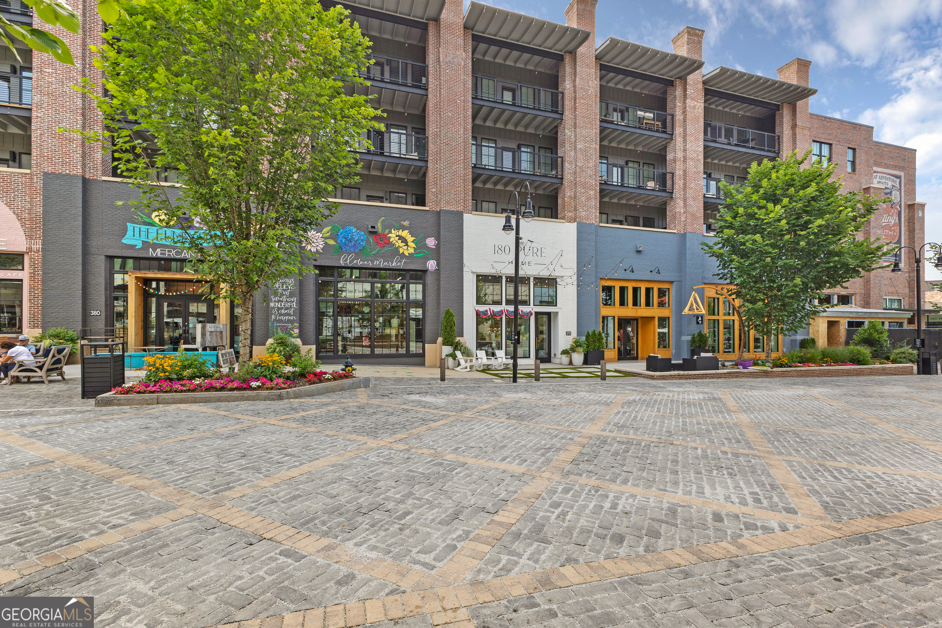 225 Rolison Way Fayetteville, GA 30214 - Photo 38 of 46 a view of a street with cars parked in front of it