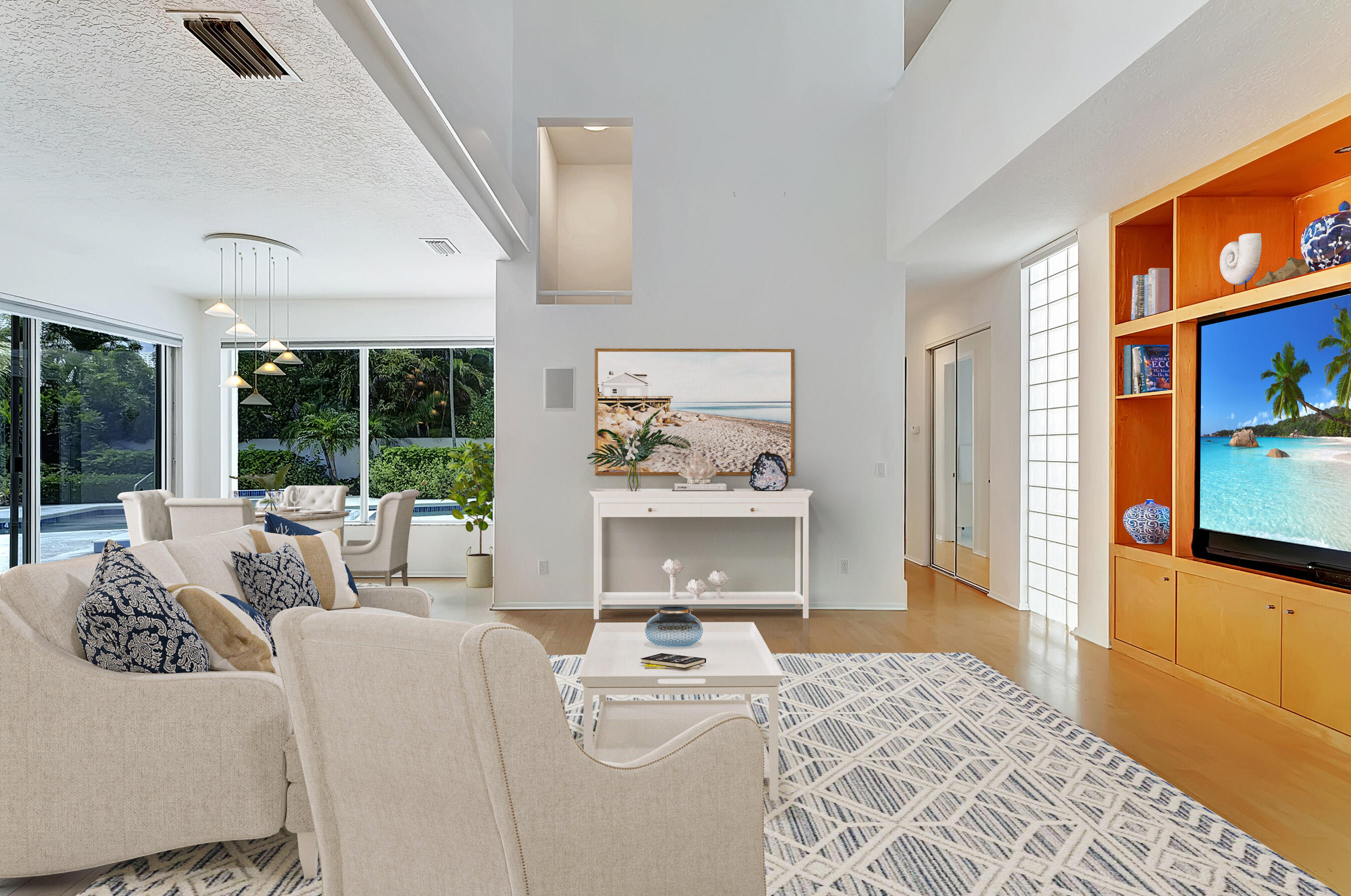 114 Olympus Circle Jupiter, FL 33477 - Photo 17 of 88 a living room with furniture and a window
