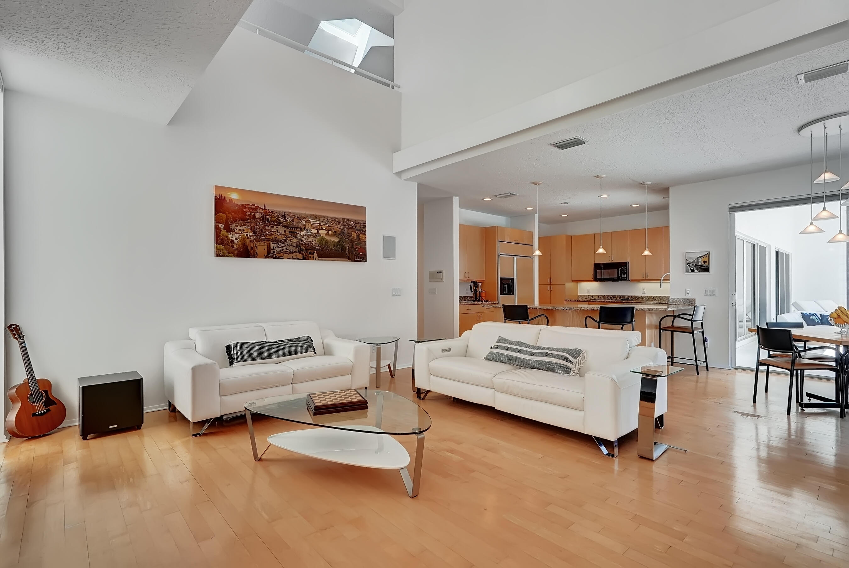 114 Olympus Circle Jupiter, FL 33477 - Photo 23 of 88 a living room with furniture and a table
