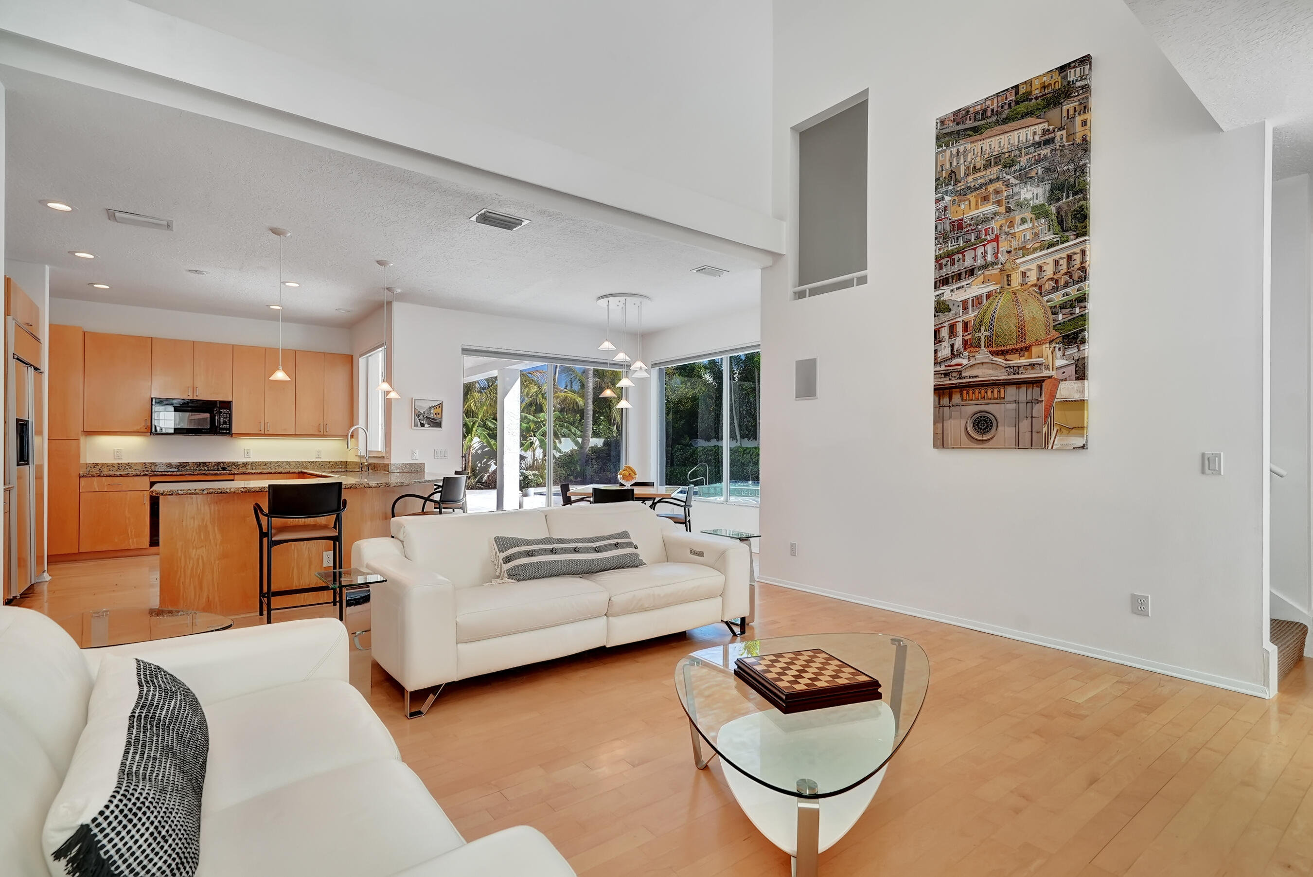 114 Olympus Circle Jupiter, FL 33477 - Photo 24 of 88 a living room with furniture and a rug