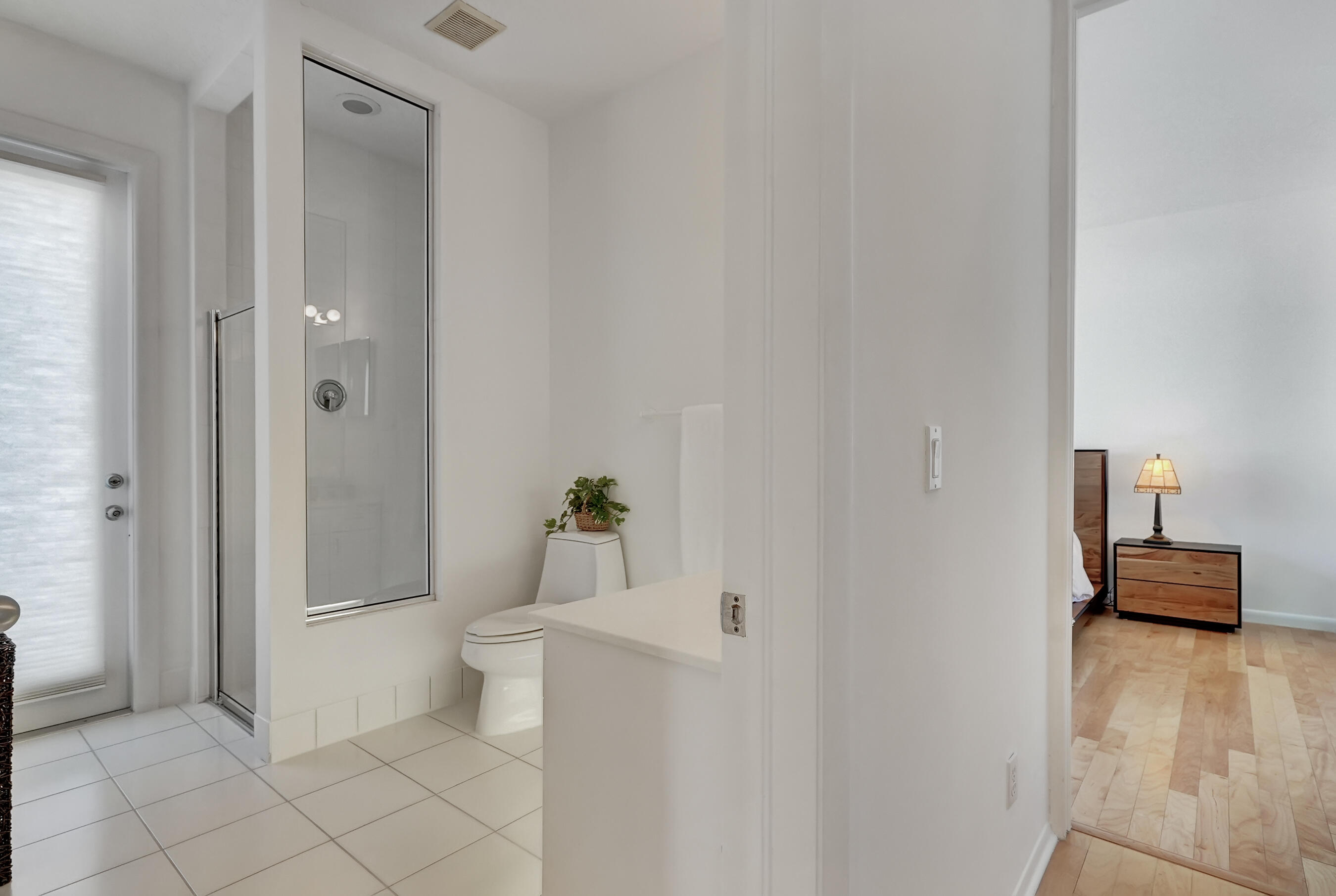 114 Olympus Circle Jupiter, FL 33477 - Photo 46 of 88 a bathroom with a toilet and a shower