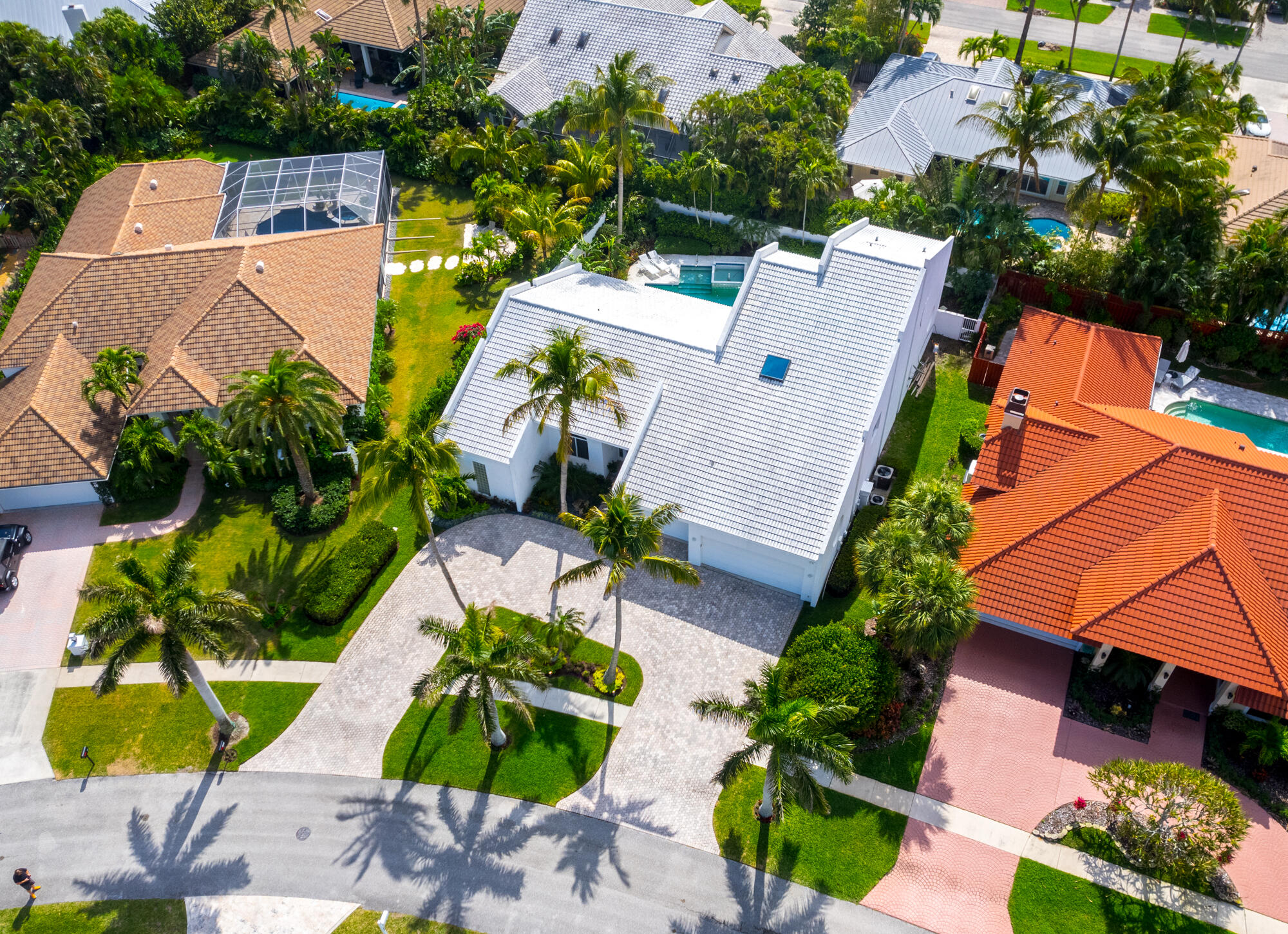 114 Olympus Circle Jupiter, FL 33477 - Photo 65 of 88 an aerial view of residential house with outdoor space and swimming pool
