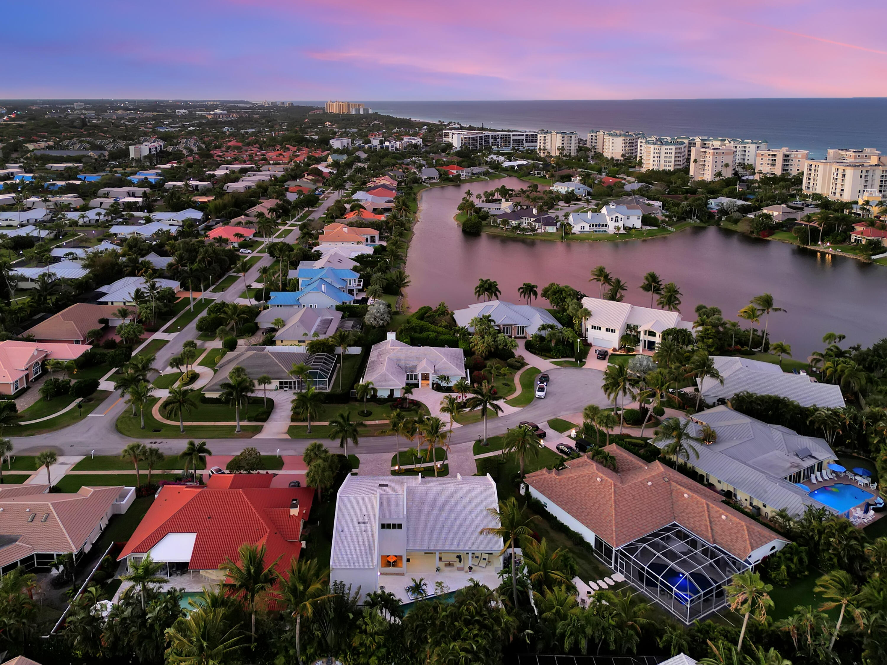 114 Olympus Circle Jupiter, FL 33477 - Photo 75 of 88 an aerial view of residential houses with outdoor space