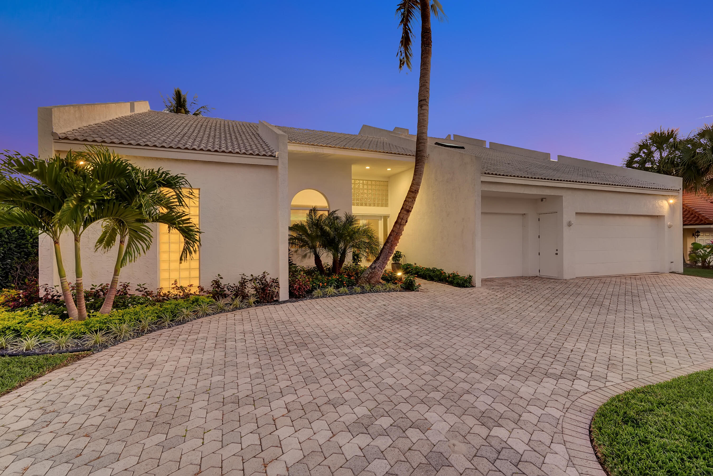 114 Olympus Circle Jupiter, FL 33477 - Photo 79 of 88 a view of a house with a yard