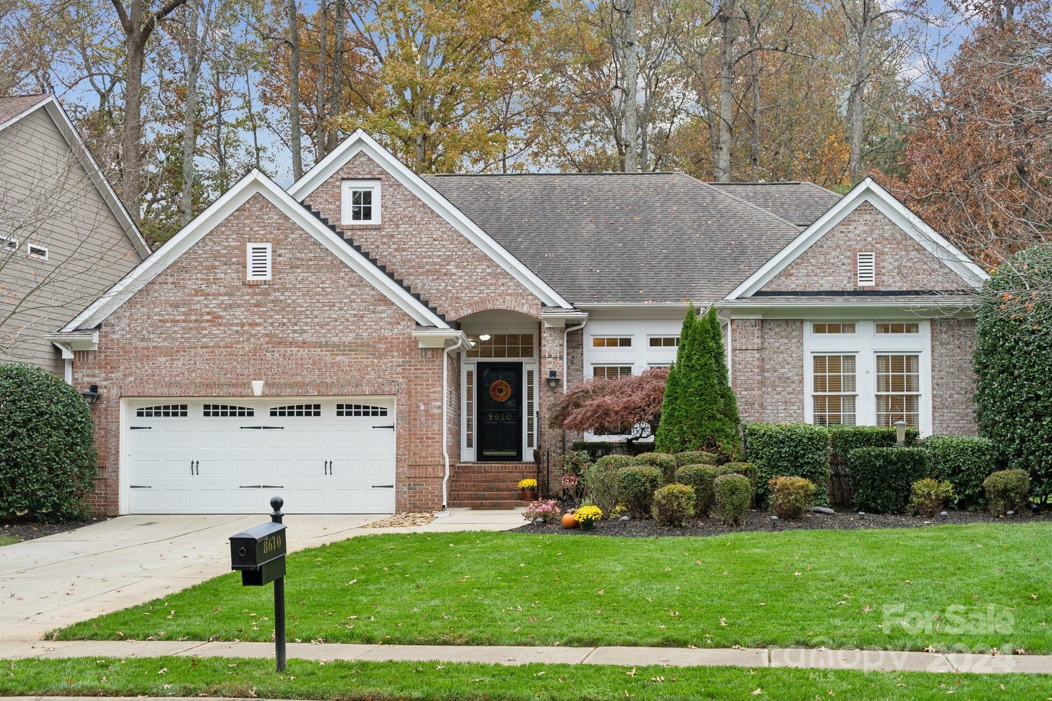8610 Brentfield Road Huntersville, NC 28078 - Photo 1 of 48 a front view of a house with a yard