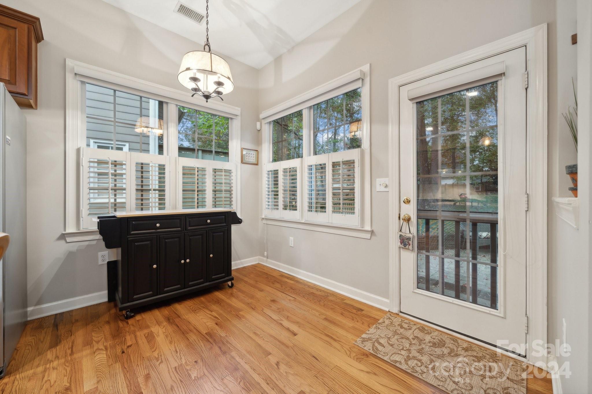 8610 Brentfield Road Huntersville, NC 28078 - Photo 15 of 48 a room that has a window and wooden floor