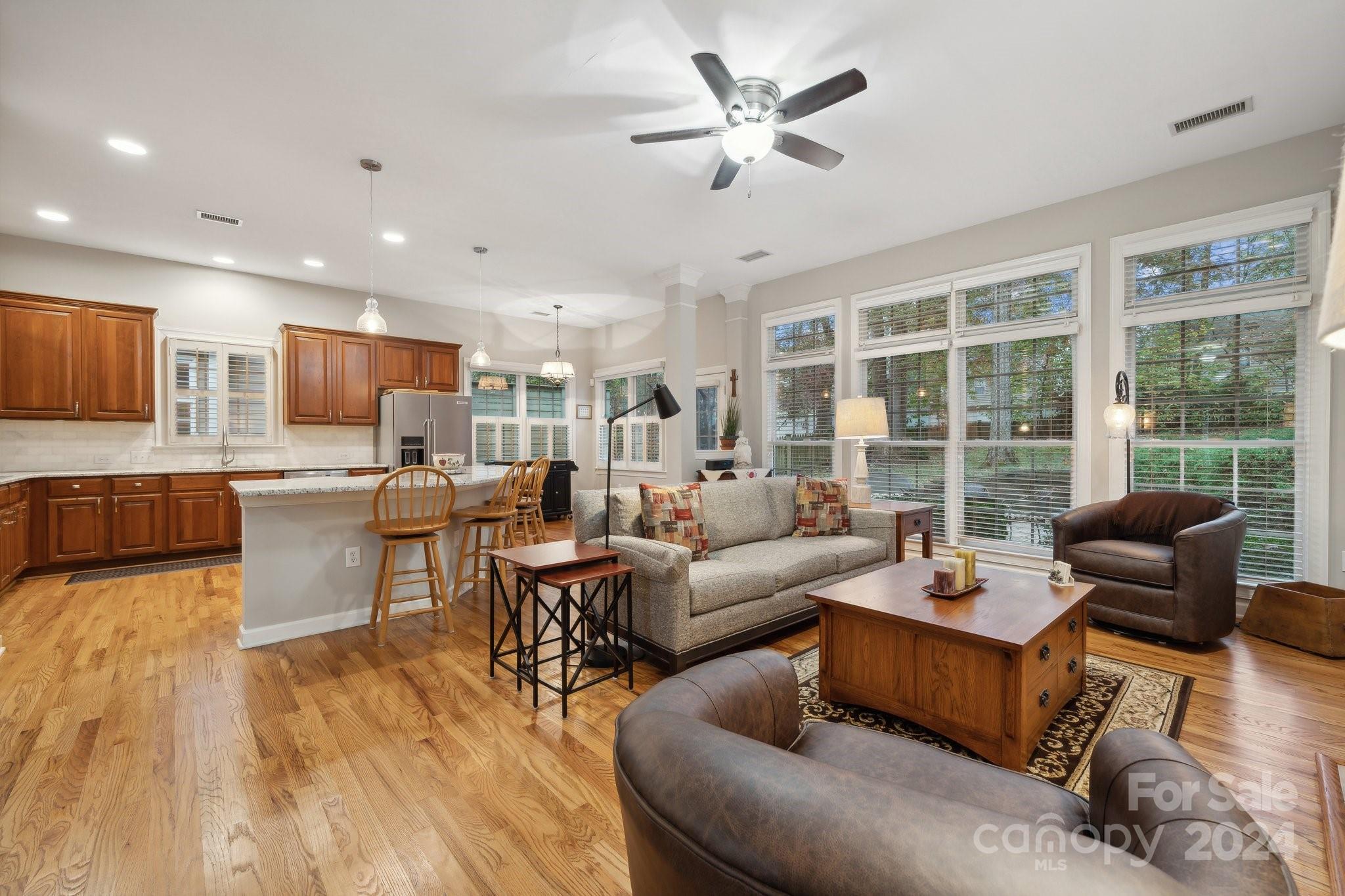 8610 Brentfield Road Huntersville, NC 28078 - Photo 17 of 48 a living room with furniture fireplace and a large window