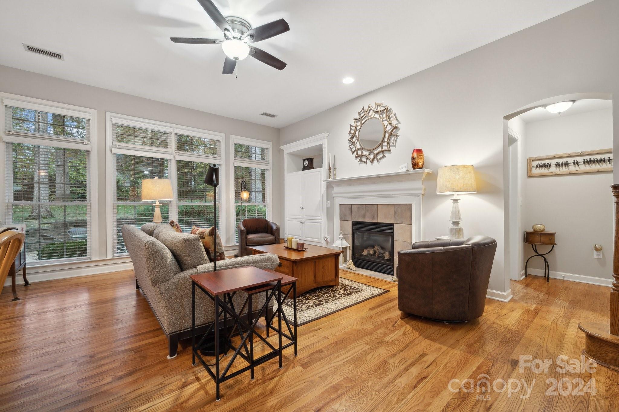 8610 Brentfield Road Huntersville, NC 28078 - Photo 18 of 48 a living room with furniture and a fireplace
