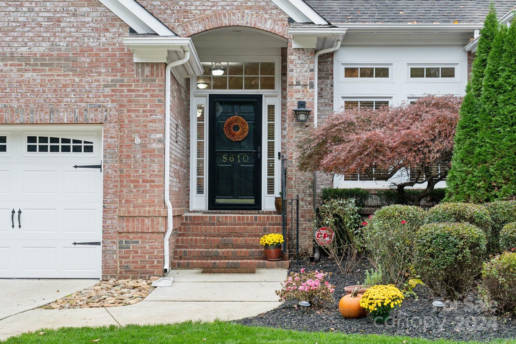 8610 Brentfield Road Huntersville, NC 28078 - Photo 2 of 48 a front view of a house with garden