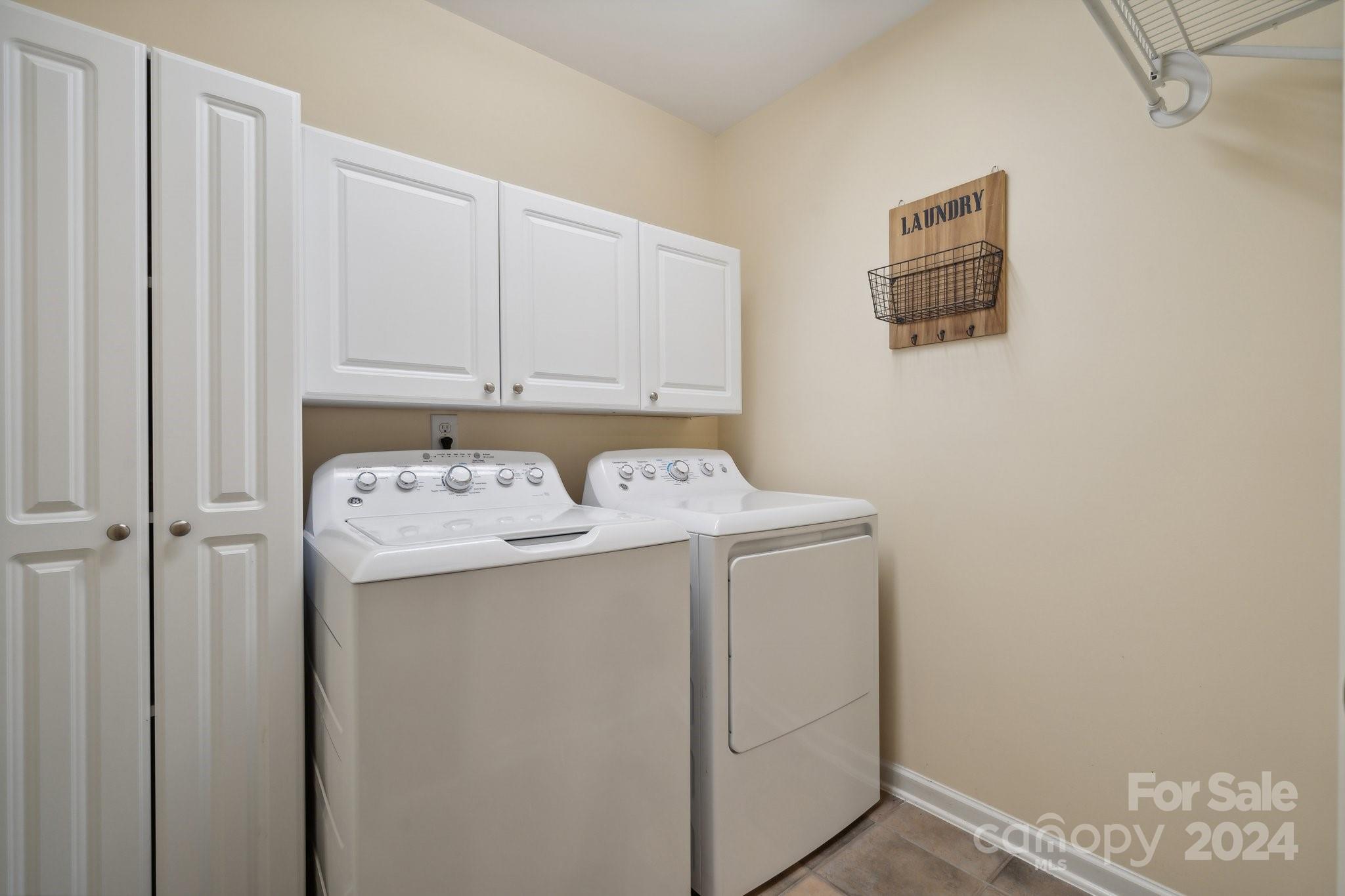 8610 Brentfield Road Huntersville, NC 28078 - Photo 28 of 48 a utility room with dryer and washer