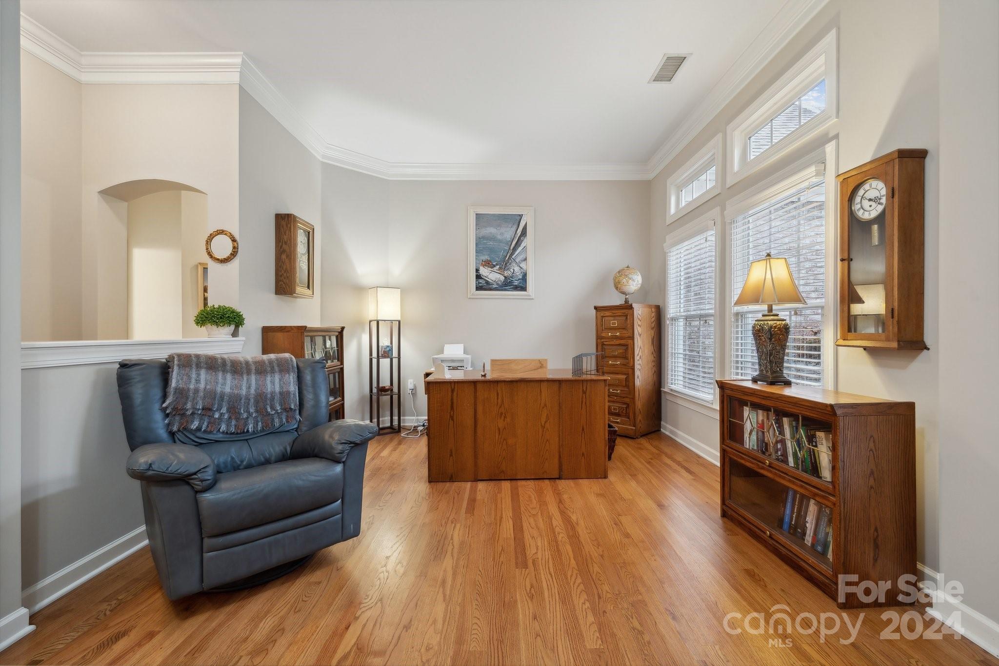 8610 Brentfield Road Huntersville, NC 28078 - Photo 4 of 48 a living room with furniture and wooden floor