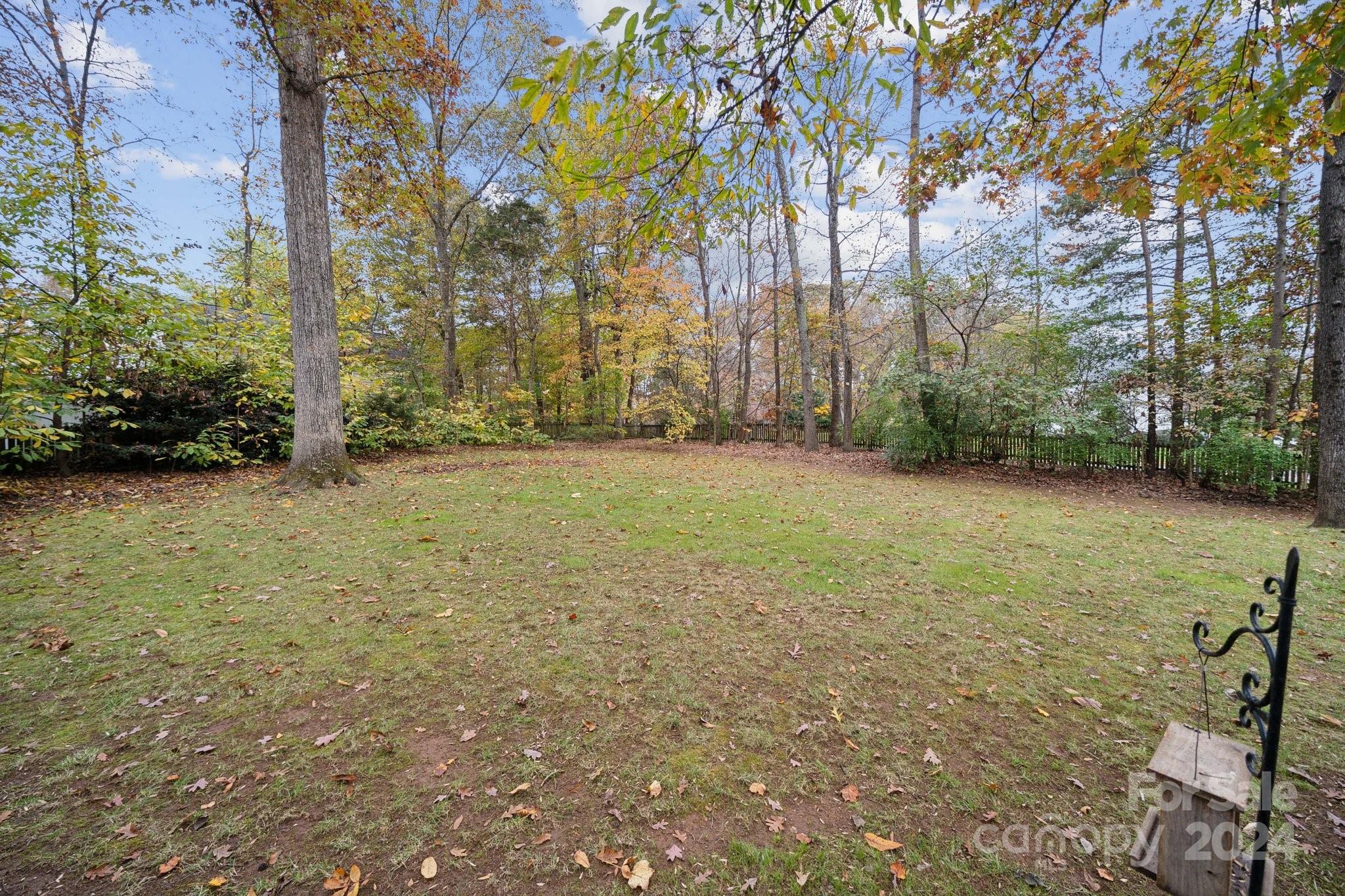 8610 Brentfield Road Huntersville, NC 28078 - Photo 42 of 48 a view of a yard with a tree