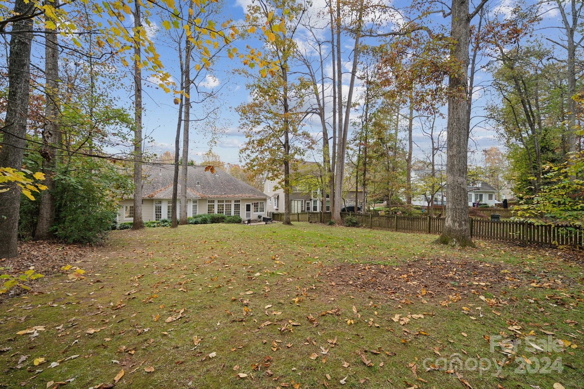 8610 Brentfield Road Huntersville, NC 28078 - Photo 43 of 48 a swimming pool with trees in the background