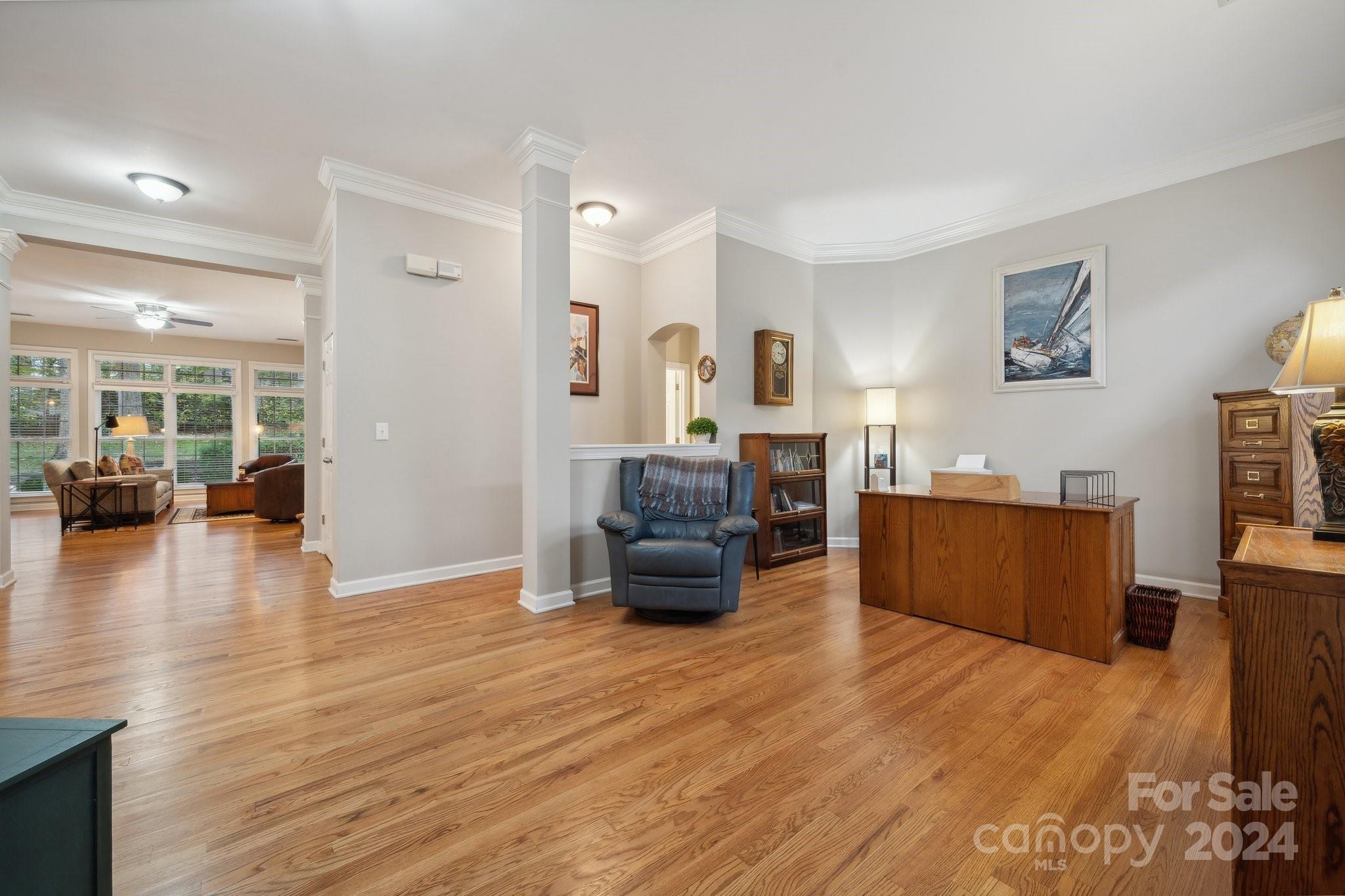 8610 Brentfield Road Huntersville, NC 28078 - Photo 5 of 48 a living room with furniture and a wooden floor