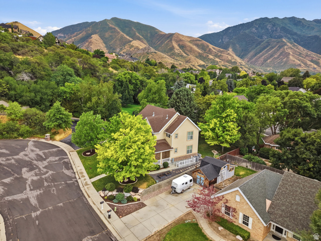 2388 East 850 South Springville, UT 84663 - Photo 1 of 24 Property exterior featuring a beige facade, brown roof, and multiple windows