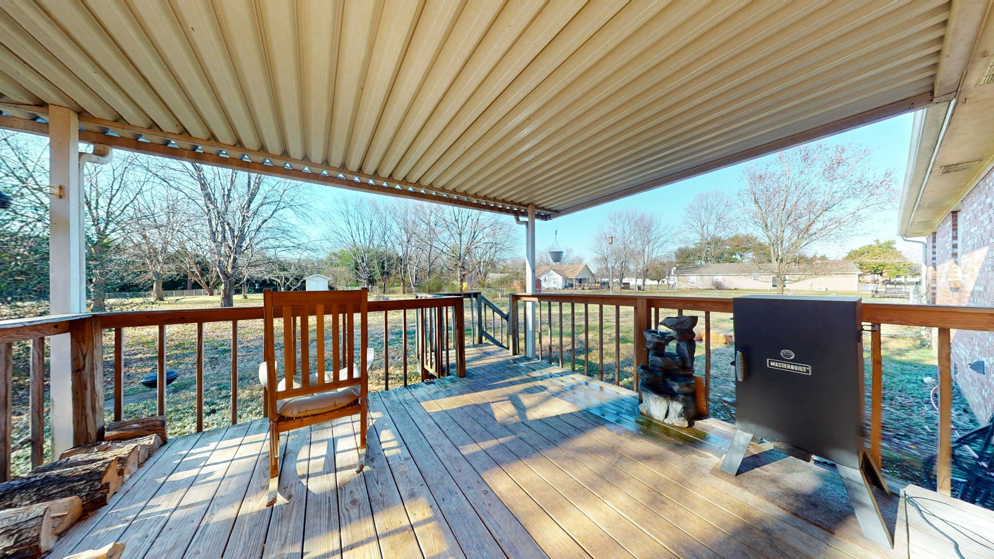 633 Buck Lane Murfreesboro, TN 37129 - Photo 11 of 16 a balcony with wooden floor table and chairs