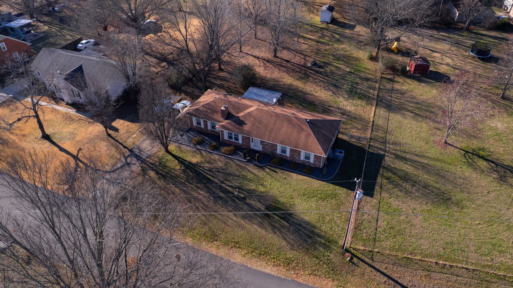 633 Buck Lane Murfreesboro, TN 37129 - Photo 14 of 16 a view of a backyard with a barn